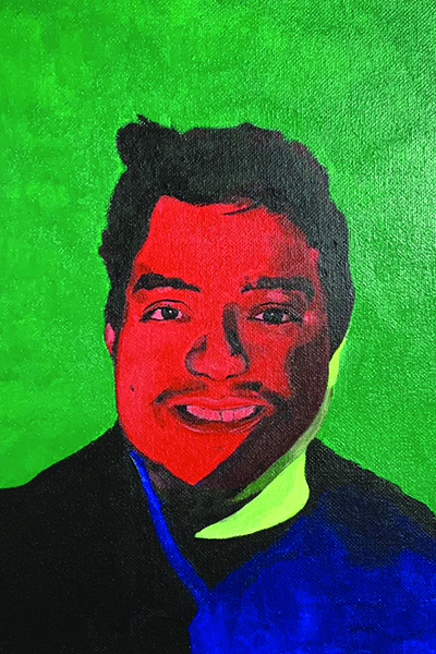 A painting of a smiling man. The man is painted in tones of red, yellow, blue and black, set against a green background